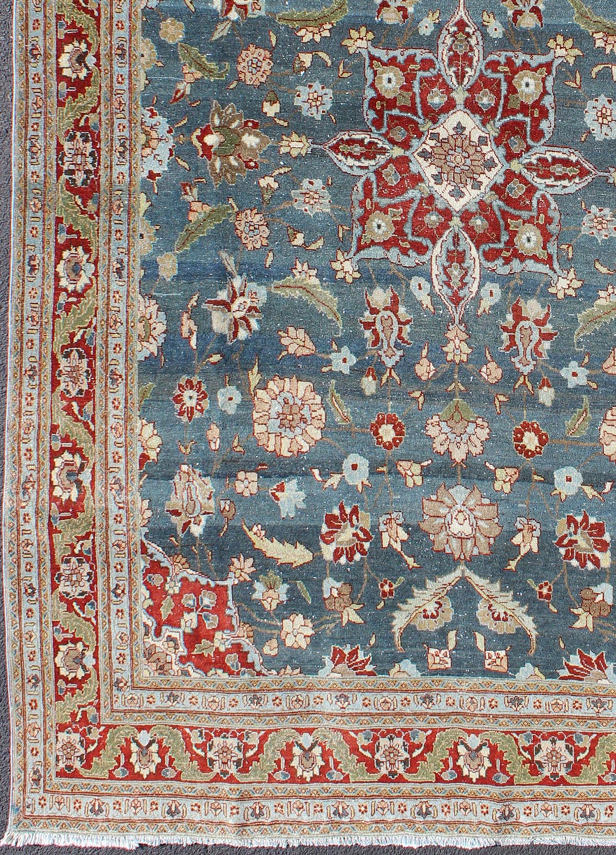 Antique Persian Tabriz Rug with Floral Medallion Design in Steel Blue & Red. Steel blue, antique Persian Tabriz rug with flowers and medallion, rug 18 - 0702, country of origin / type: Iran / Tabriz, circa 1920. This sublime and enchanting vin... - Keivan Woven Arts18 - 0702 - 10002Rug