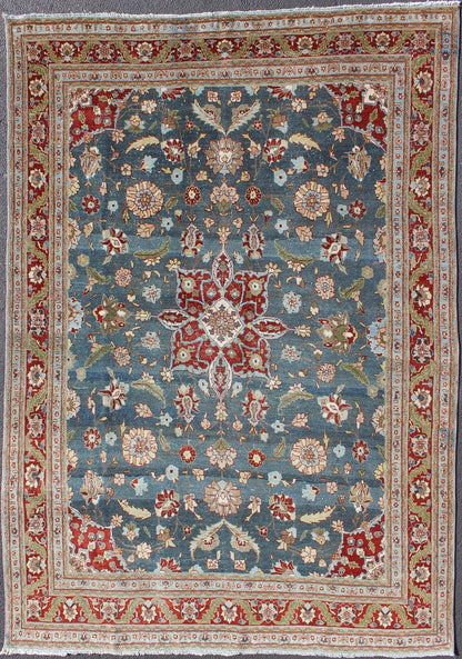 Antique Persian Tabriz Rug with Floral Medallion Design in Steel Blue & Red. Steel blue, antique Persian Tabriz rug with flowers and medallion, rug 18 - 0702, country of origin / type: Iran / Tabriz, circa 1920. This sublime and enchanting vin... - Keivan Woven Arts18 - 0702 - 10002Rug