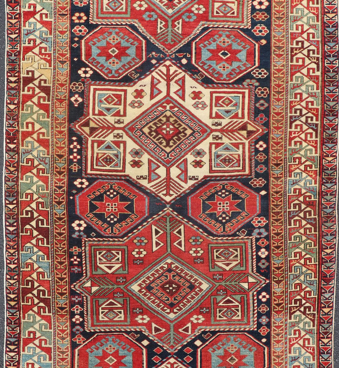 Multicolored Medallions Antique Caucasian Kazak Rug with Geometrics Motifs Geometric Design Kazak Caucasian Antique rug in jewel tones with layered medallions. Keivan Woven Arts / rug 18 - 1001, country of origin / type: Caucasus Kazak rugs... - Keivan Woven Arts18 - 1001 - 10571Rug