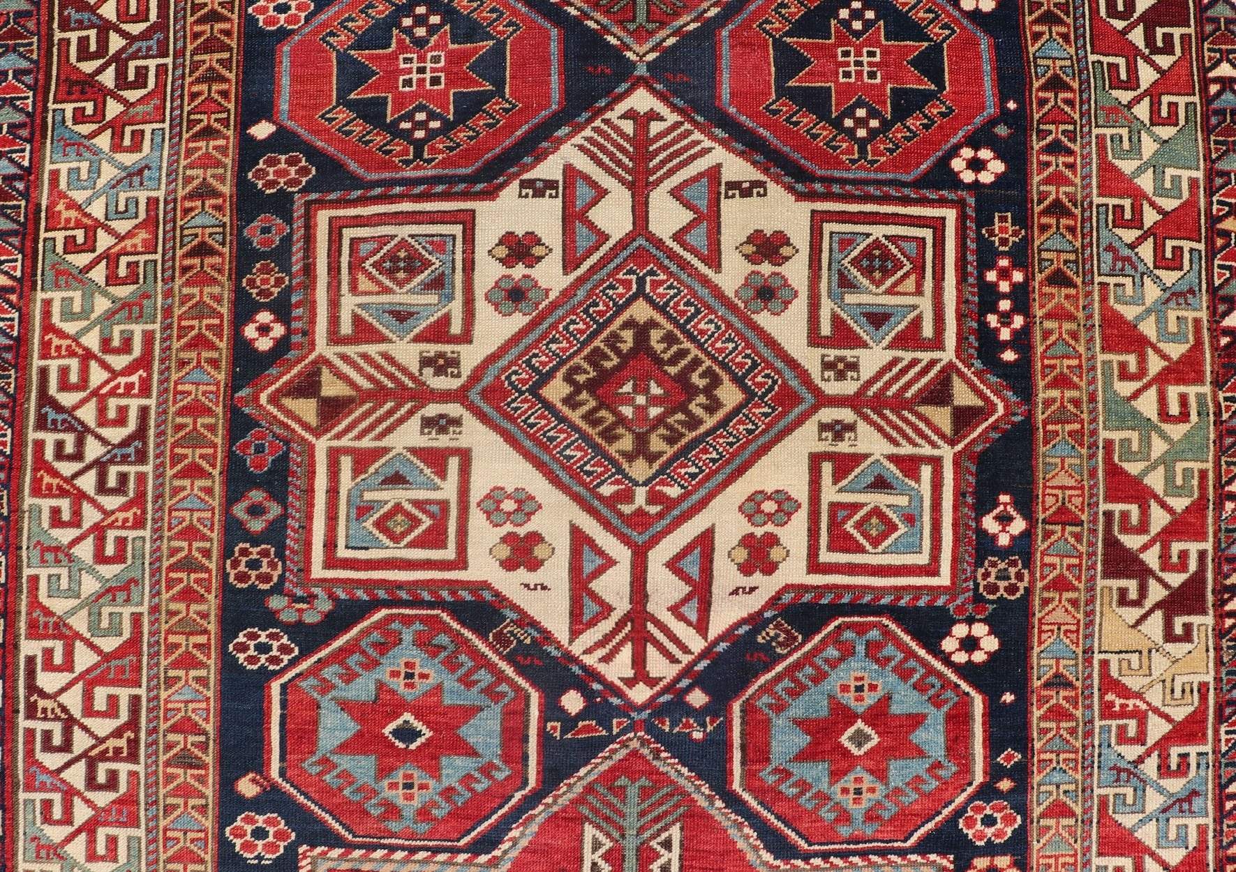 Multicolored Medallions Antique Caucasian Kazak Rug with Geometrics Motifs Geometric Design Kazak Caucasian Antique rug in jewel tones with layered medallions. Keivan Woven Arts / rug 18 - 1001, country of origin / type: Caucasus Kazak rugs... - Keivan Woven Arts18 - 1001 - 10571Rug