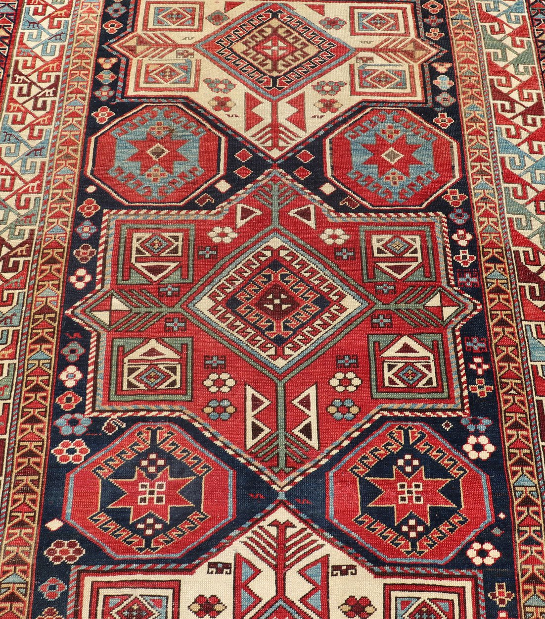 Multicolored Medallions Antique Caucasian Kazak Rug with Geometrics Motifs Geometric Design Kazak Caucasian Antique rug in jewel tones with layered medallions. Keivan Woven Arts / rug 18 - 1001, country of origin / type: Caucasus Kazak rugs... - Keivan Woven Arts18 - 1001 - 10571Rug