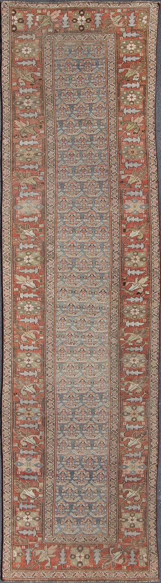 Gray background and soft red - colored Persian Kurdish antique runner in Tribal design with geometric motifs, rug 19 - 0105, country of origin / type: Iran / Kurdish, circa 1900. This antique Kurdish tribal rug was woven by Kurdish weavers in wester... - Keivan Woven Arts19 - 0105 - 11106Rug