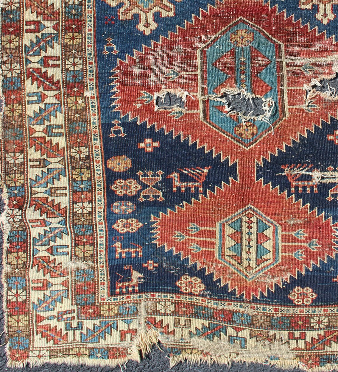 This Early Caucasian rug draws its' uniqueness from a beautiful color combination and great drawing. This rug is an early version of Shirvan and could greatly benefit from a proper restoration 3'3 x 4'3 - Keivan Woven Arts19 - 0205 - 11124Rug