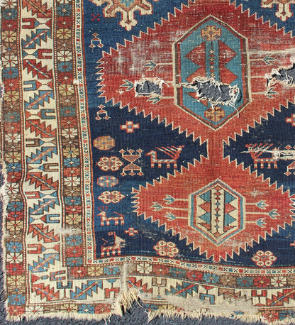 This Early Caucasian rug draws its' uniqueness from a beautiful color combination and great drawing. This rug is an early version of Shirvan and could greatly benefit from a proper restoration 3'3 x 4'3 - Keivan Woven Arts19 - 0205 - 11124Rug