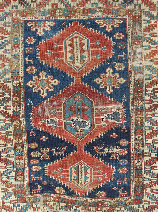 This Early Caucasian rug draws its' uniqueness from a beautiful color combination and great drawing. This rug is an early version of Shirvan and could greatly benefit from a proper restoration 3'3 x 4'3 - Keivan Woven Arts19 - 0205 - 11124
