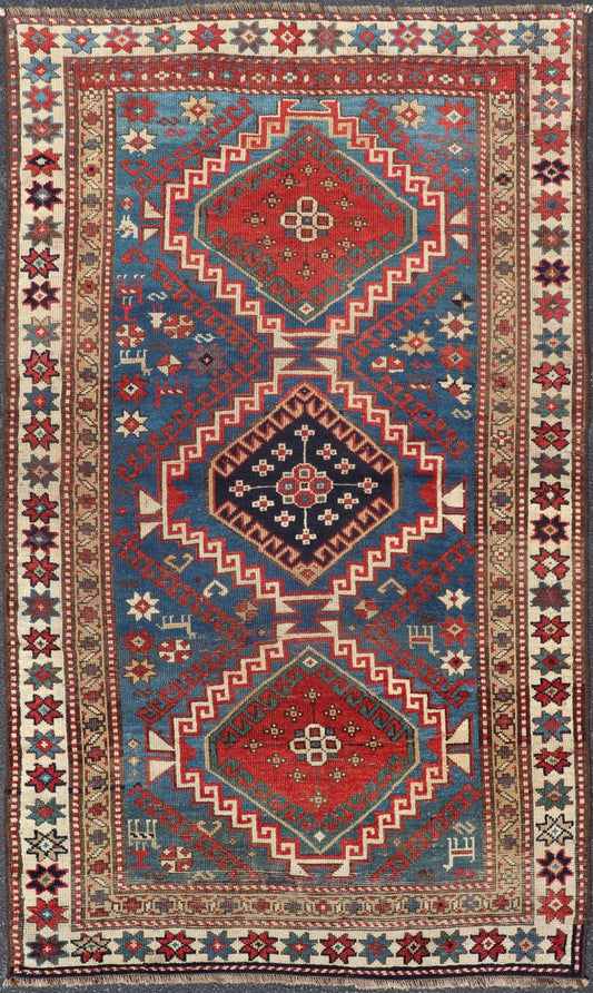 Remarkable Antique Caucasian Kazak Rug in Brilliant Blue with Geometric Design. Tribal geometric medallion design Kazak antique rug, antique Caucasian from Caucasus Region with a beautiful blue background in multi - colors. Keivan Woven Arts / rug... - Keivan Woven Arts19 - 0601 - 11350Rug