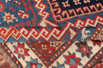 Remarkable Antique Caucasian Kazak Rug in Brilliant Blue with Geometric Design. Tribal geometric medallion design Kazak antique rug, antique Caucasian from Caucasus Region with a beautiful blue background in multi - colors. Keivan Woven Arts / rug... - Keivan Woven Arts19 - 0601 - 11350Rug