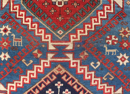 Remarkable Antique Caucasian Kazak Rug in Brilliant Blue with Geometric Design. Tribal geometric medallion design Kazak antique rug, antique Caucasian from Caucasus Region with a beautiful blue background in multi - colors. Keivan Woven Arts / rug... - Keivan Woven Arts19 - 0601 - 11350Rug