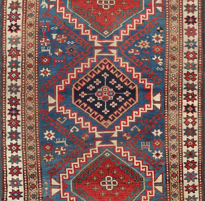 Remarkable Antique Caucasian Kazak Rug in Brilliant Blue with Geometric Design. Tribal geometric medallion design Kazak antique rug, antique Caucasian from Caucasus Region with a beautiful blue background in multi - colors. Keivan Woven Arts / rug... - Keivan Woven Arts19 - 0601 - 11350Rug