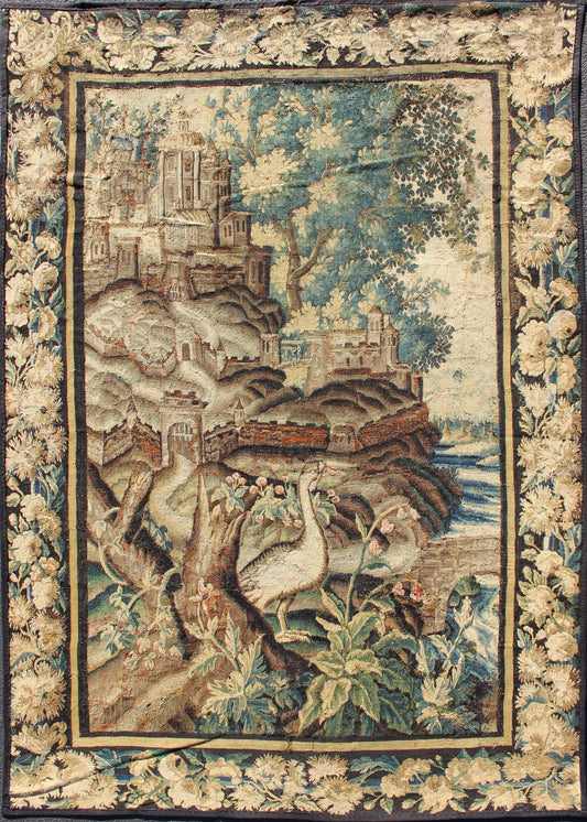 Antique 17th Century Scenic Tapestry with Abundant Vegetation and Floral Border. This wonderful antique 17th century tapestry beautifully illustrates the remarkable sense of depth and richness that was perfected by artisans of the 17th century. A r... - Keivan Woven Arts19 - 0803 - 11511Rug