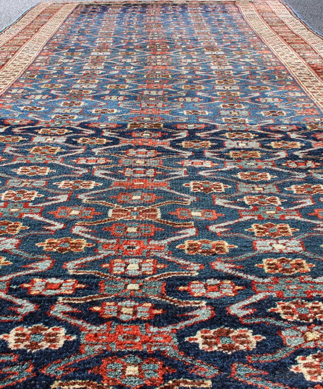 Antique Kurdish Gallery Rug with All - Over Geometric large scale Herati Design in Steel Blue Background, cream and brown border, with accent colors of red, blue, green, ivory and Light blue, Keivan Woven Arts/rug 19 - 0808, country of origin / type: Iran ... - Keivan Woven Arts19 - 0808 - 11575Rug
