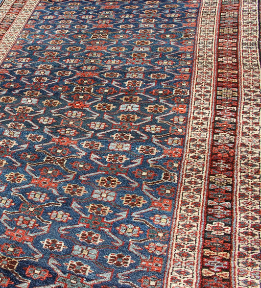 Antique Kurdish Gallery Rug with All - Over Geometric large scale Herati Design in Steel Blue Background, cream and brown border, with accent colors of red, blue, green, ivory and Light blue, Keivan Woven Arts/rug 19 - 0808, country of origin / type: Iran ... - Keivan Woven Arts19 - 0808 - 11575Rug