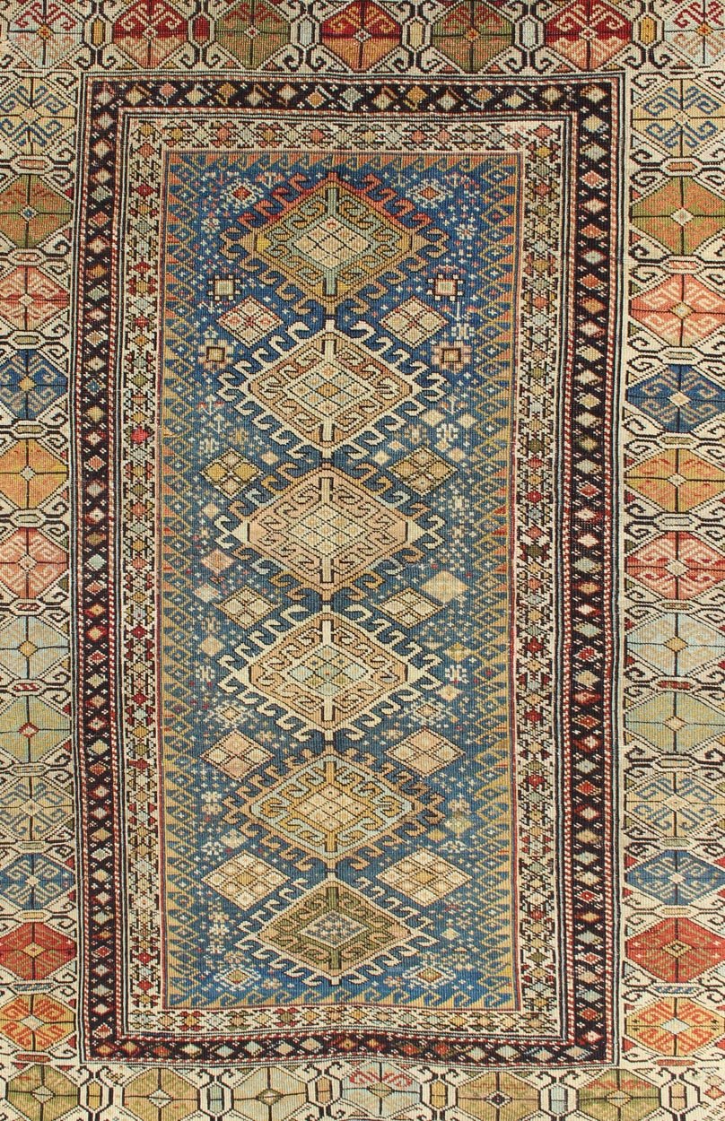 Antique 19th Century Caucasian Shirvan Rug with Medallions in Teal blue Background and Multi Colors. Shirvan Antique Caucasian Rug in Colorful Tones, rug 19 - 0810, country of origin / type: Caucasus / Shirvan, circa 1880 This colorful medall... - Keivan Woven Arts19 - 0810 - 11581Rug