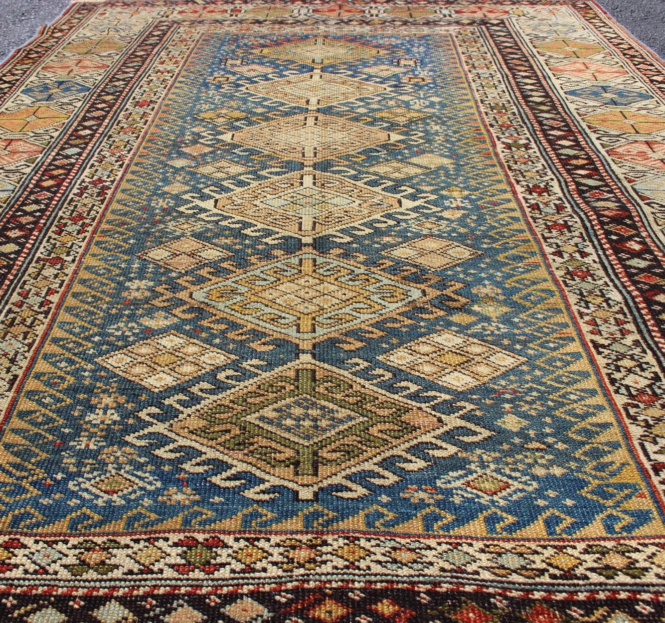 Antique 19th Century Caucasian Shirvan Rug with Medallions in Teal blue Background and Multi Colors. Shirvan Antique Caucasian Rug in Colorful Tones, rug 19 - 0810, country of origin / type: Caucasus / Shirvan, circa 1880 This colorful medall... - Keivan Woven Arts19 - 0810 - 11581Rug