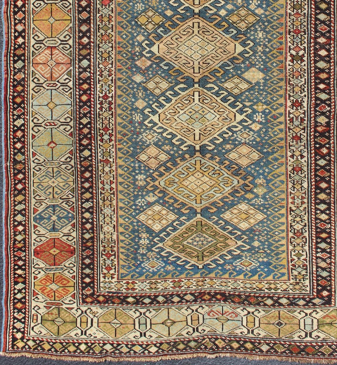 Antique 19th Century Caucasian Shirvan Rug with Medallions in Teal blue Background and Multi Colors. Shirvan Antique Caucasian Rug in Colorful Tones, rug 19 - 0810, country of origin / type: Caucasus / Shirvan, circa 1880 This colorful medall... - Keivan Woven Arts19 - 0810 - 11581Rug