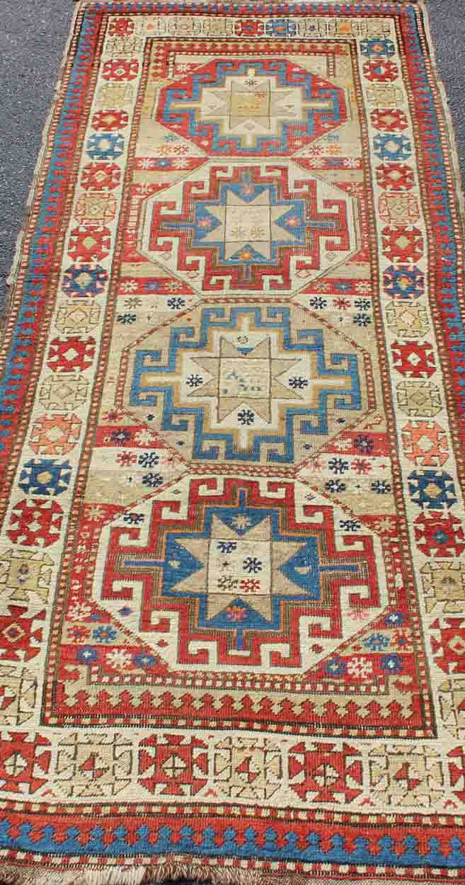 Multicolored Medallion Antique Caucasian Kazak Rug with Geometric Medallions Geometric Medallion antique Caucasian Kazak rug in lighter tones. Keivan Woven Arts / rug 19 - 0811, country of origin / type: Iran / Caucasian Kazak, circa 1880. ... - Keivan Woven Arts19 - 0811 - 11585Rug