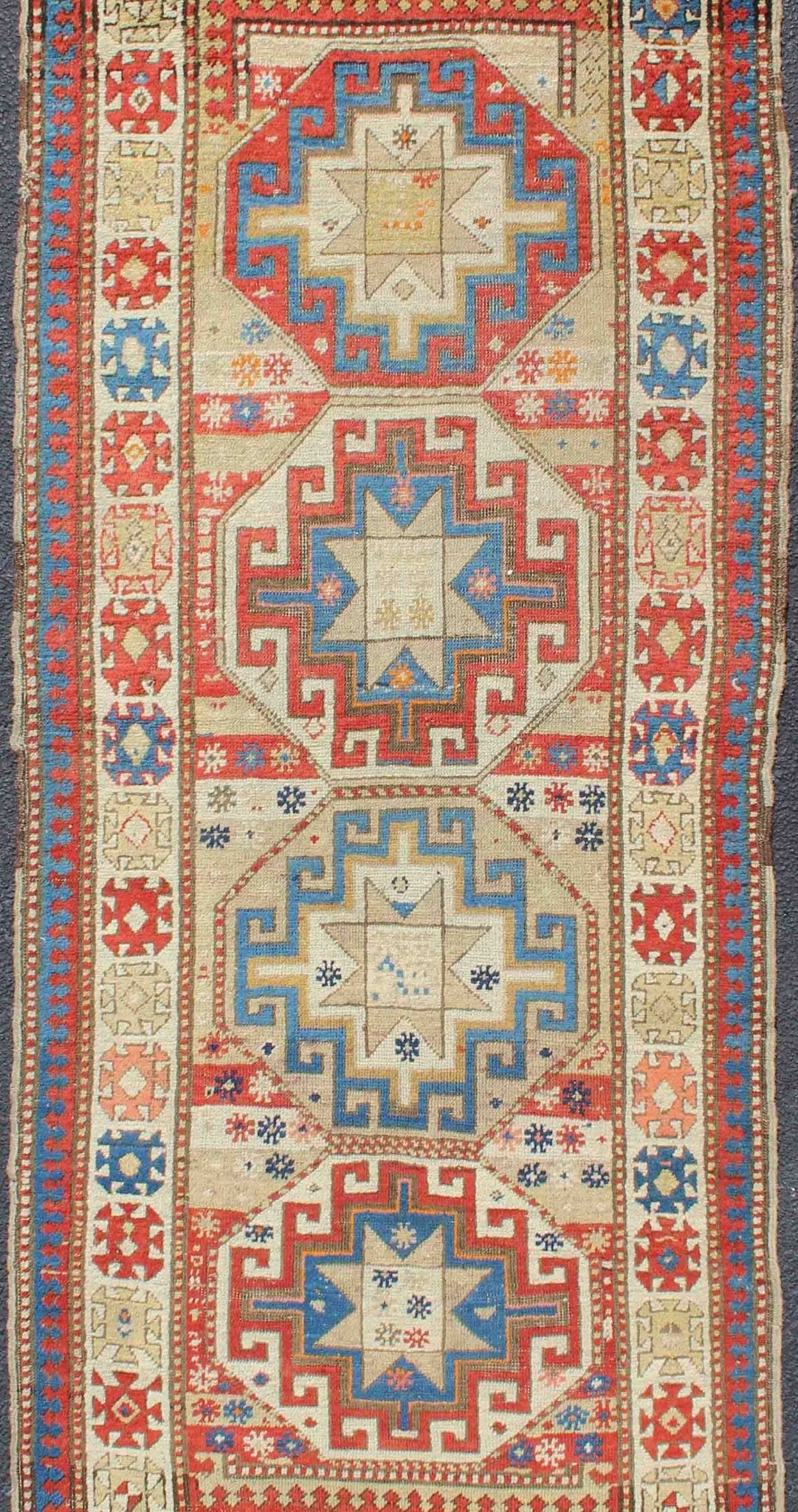 Multicolored Medallion Antique Caucasian Kazak Rug with Geometric Medallions Geometric Medallion antique Caucasian Kazak rug in lighter tones. Keivan Woven Arts / rug 19 - 0811, country of origin / type: Iran / Caucasian Kazak, circa 1880. ... - Keivan Woven Arts19 - 0811 - 11585Rug