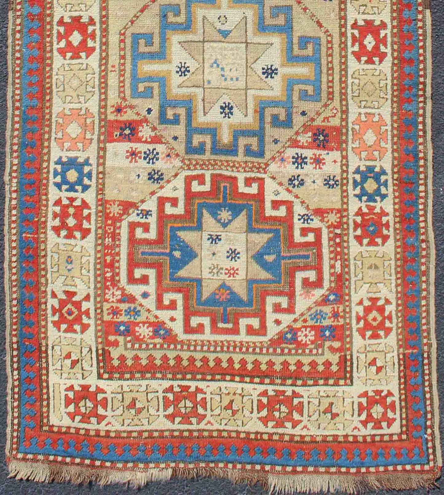Multicolored Medallion Antique Caucasian Kazak Rug with Geometric Medallions Geometric Medallion antique Caucasian Kazak rug in lighter tones. Keivan Woven Arts / rug 19 - 0811, country of origin / type: Iran / Caucasian Kazak, circa 1880. ... - Keivan Woven Arts19 - 0811 - 11585Rug
