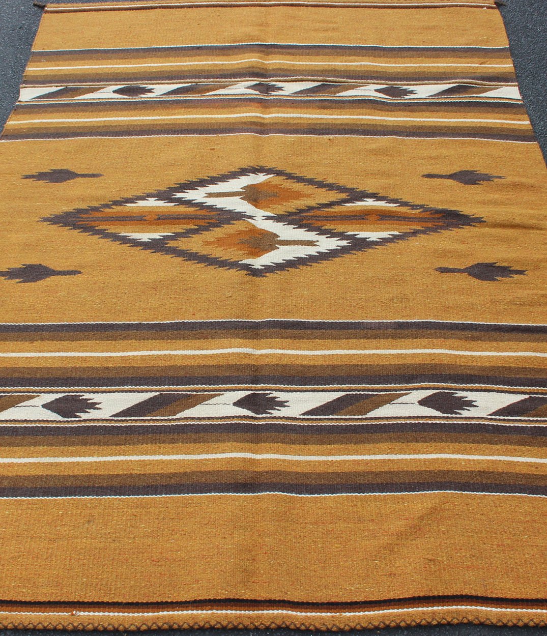 Mexican Serapi design in Navajo style with Tribal Design in Earthy Tones 1930s Mexican rug, American Navajo style Kilim with geometric design in Marigold, brown, and ivory rug 1912 - 1511, country of origin / type: America / Navajo, circa 1930 ... - Keivan Woven Arts1912 - 1511 - 12293Rug