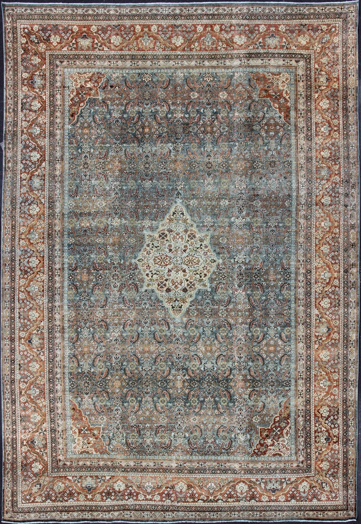 Distressed Antique Persian Sultanabad Rug in Steel Blue Background, Green, Red. Sultanabad Mahal antique rug from Persia with all - over geometric design and small medallion and four cornices. Keivan Woven Arts/ rug 1912 - 175, country of origin / type: Ir... - Keivan Woven Arts1912 - 175 - 12267Rug