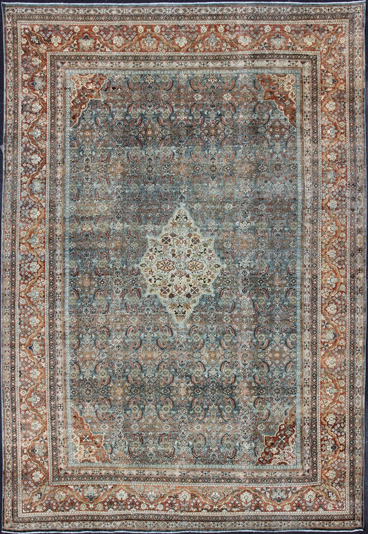 Distressed Antique Persian Sultanabad Rug in Steel Blue Background, Green, Red. Sultanabad Mahal antique rug from Persia with all - over geometric design and small medallion and four cornices. Keivan Woven Arts/ rug 1912 - 175, country of origin / type: Ir... - Keivan Woven Arts1912 - 175 - 12267Rug