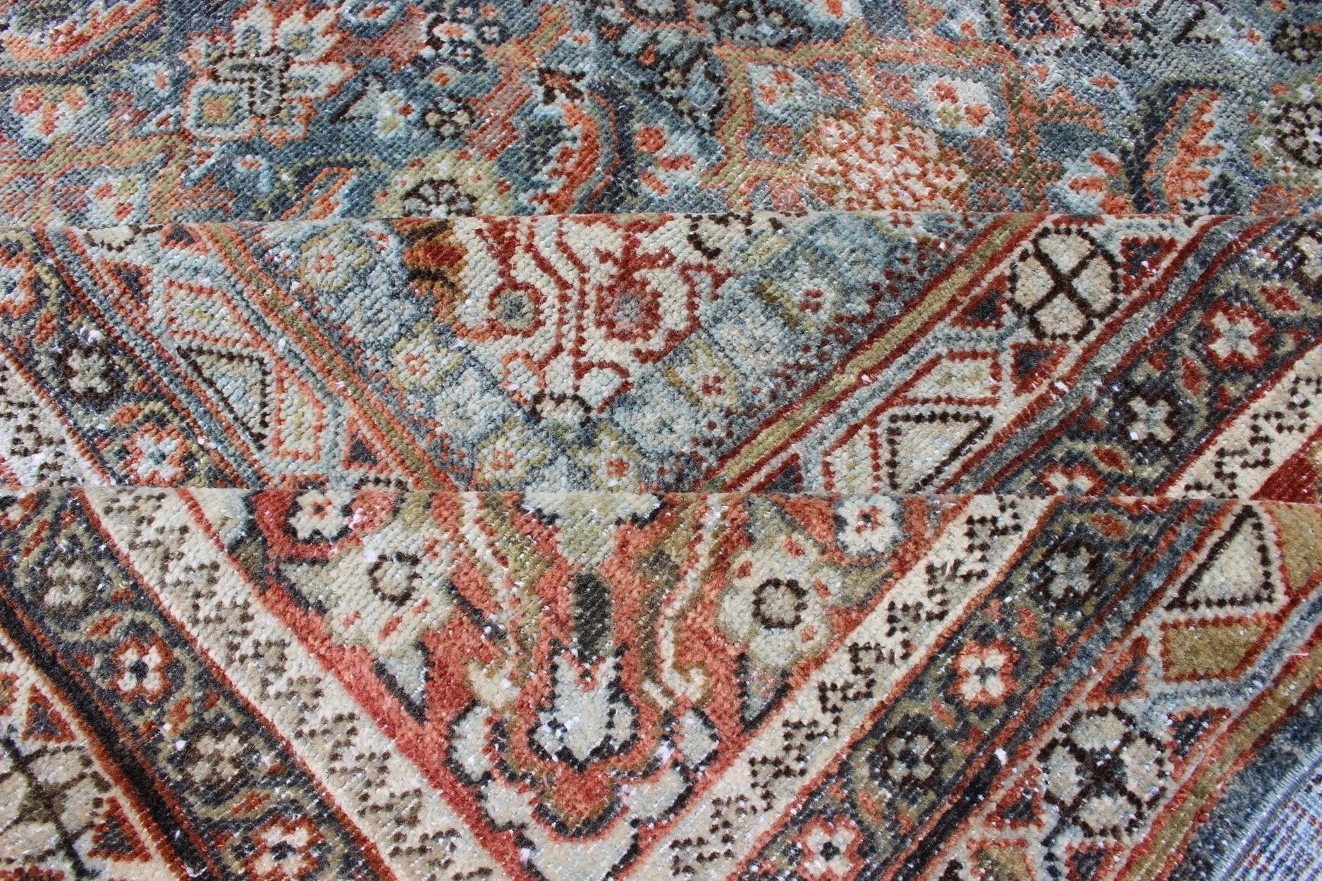 Distressed Antique Persian Sultanabad Rug in Steel Blue Background, Green, Red. Sultanabad Mahal antique rug from Persia with all - over geometric design and small medallion and four cornices. Keivan Woven Arts/ rug 1912 - 175, country of origin / type: Ir... - Keivan Woven Arts1912 - 175 - 12267Rug