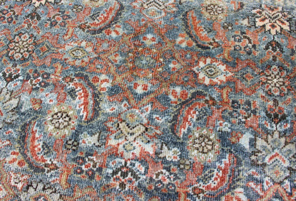 Distressed Antique Persian Sultanabad Rug in Steel Blue Background, Green, Red. Sultanabad Mahal antique rug from Persia with all - over geometric design and small medallion and four cornices. Keivan Woven Arts/ rug 1912 - 175, country of origin / type: Ir... - Keivan Woven Arts1912 - 175 - 12267Rug