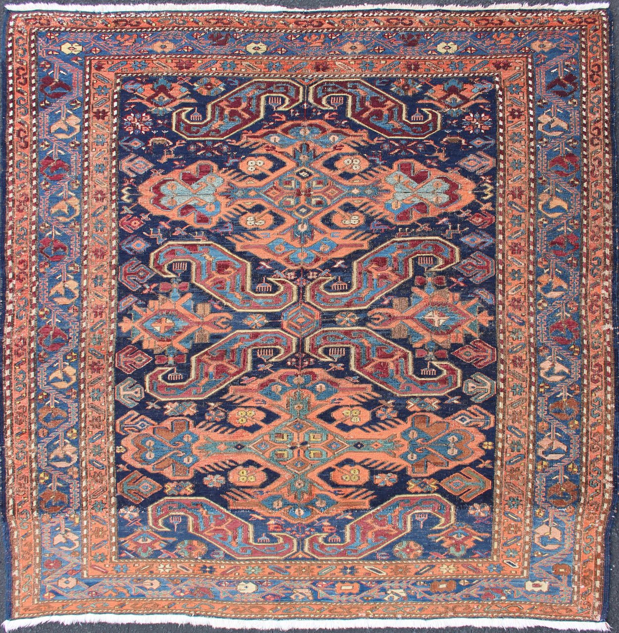 Antique Caucasian 19th Century Sumac Rug in Varying Colors of Orange and Blue. Keivan Woven Arts / rug 1912 - 23, country of origin / type: Caucus / Caucasian, circa 1900. Measures: 5'3 x 5'5. This magnificent antique Caucasian Sumac rug from the e... - Keivan Woven Arts1912 - 23 - 12237Rug