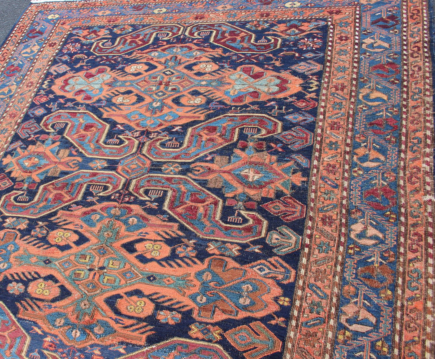 Antique Caucasian 19th Century Sumac Rug in Varying Colors of Orange and Blue. Keivan Woven Arts / rug 1912 - 23, country of origin / type: Caucus / Caucasian, circa 1900. Measures: 5'3 x 5'5. This magnificent antique Caucasian Sumac rug from the e... - Keivan Woven Arts1912 - 23 - 12237Rug