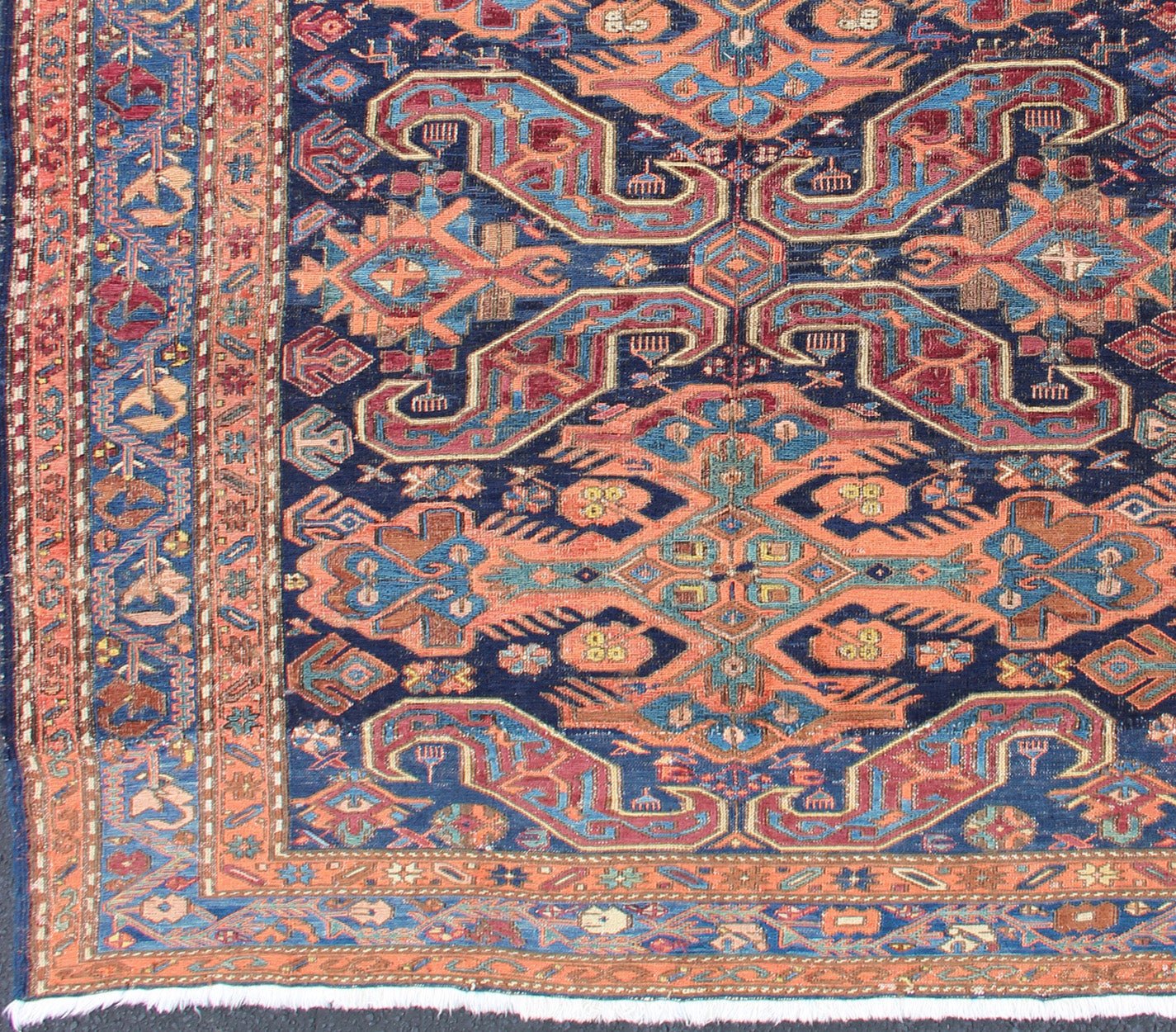 Antique Caucasian 19th Century Sumac Rug in Varying Colors of Orange and Blue. Keivan Woven Arts / rug 1912 - 23, country of origin / type: Caucus / Caucasian, circa 1900. Measures: 5'3 x 5'5. This magnificent antique Caucasian Sumac rug from the e... - Keivan Woven Arts1912 - 23 - 12237Rug