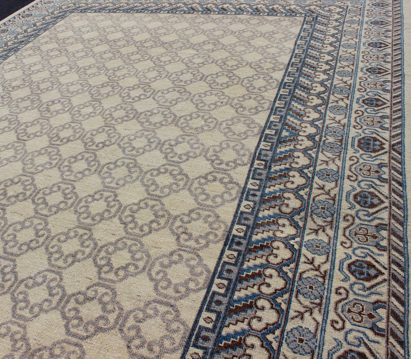Contemporary Khotan with Geometric Design in Blue, Brown & Cream Colors. Made in Afghanistan, this rug is made with finest wool and all over tribal Khotan design in the border and the background. Rug 1912 - 262, country of origin / type: Afghanis... - Keivan Woven Arts1912 - 262 - 12273Rug