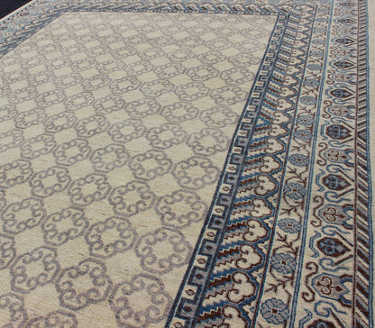 Contemporary Khotan with Geometric Design in Blue, Brown & Cream Colors. Made in Afghanistan, this rug is made with finest wool and all over tribal Khotan design in the border and the background. Rug 1912 - 262, country of origin / type: Afghanis... - Keivan Woven Arts1912 - 262 - 12273Rug