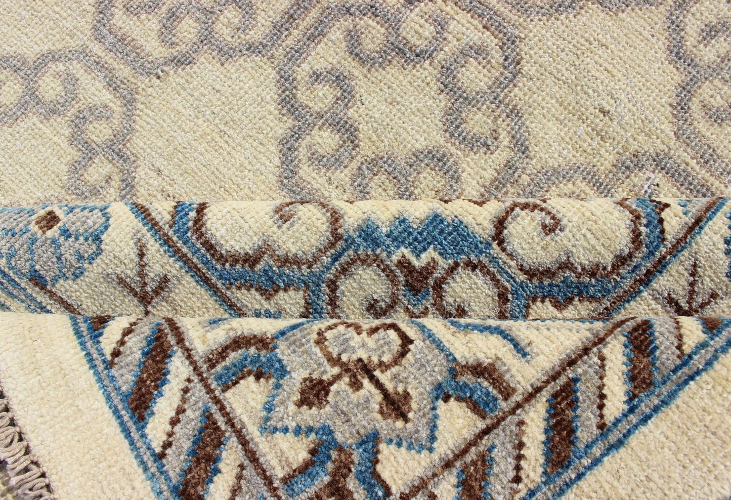 Contemporary Khotan with Geometric Design in Blue, Brown & Cream Colors. Made in Afghanistan, this rug is made with finest wool and all over tribal Khotan design in the border and the background. Rug 1912 - 262, country of origin / type: Afghanis... - Keivan Woven Arts1912 - 262 - 12273Rug