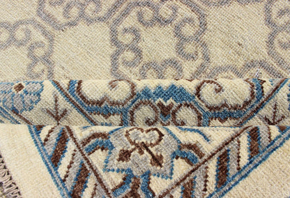Contemporary Khotan with Geometric Design in Blue, Brown & Cream Colors. Made in Afghanistan, this rug is made with finest wool and all over tribal Khotan design in the border and the background. Rug 1912 - 262, country of origin / type: Afghanis... - Keivan Woven Arts1912 - 262 - 12273Rug