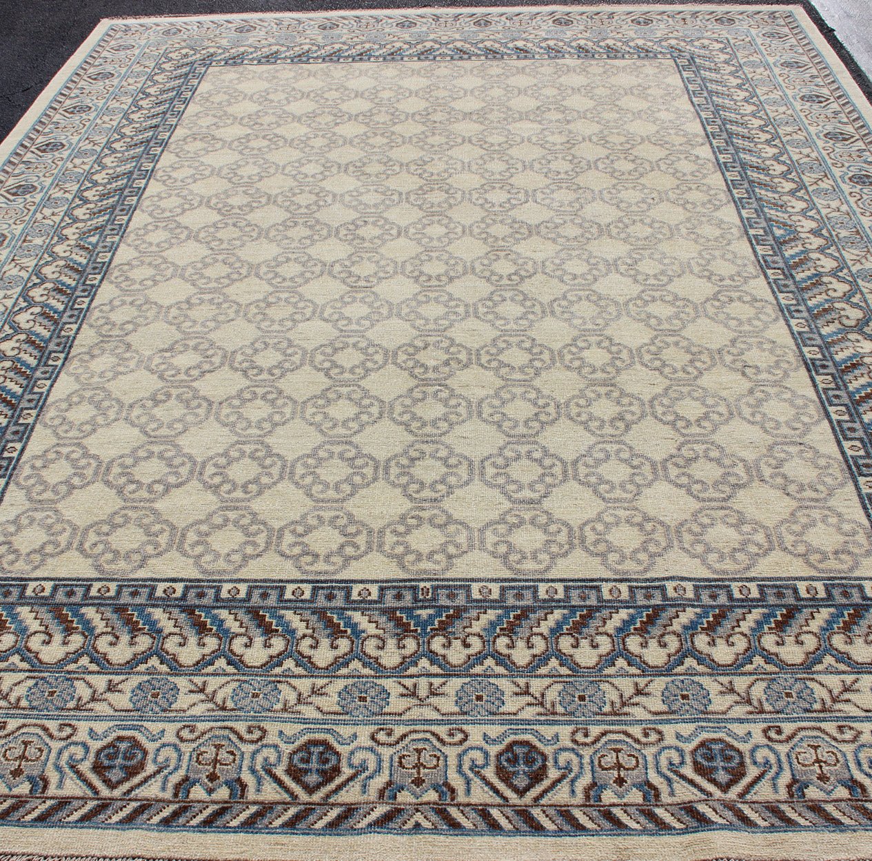 Contemporary Khotan with Geometric Design in Blue, Brown & Cream Colors. Made in Afghanistan, this rug is made with finest wool and all over tribal Khotan design in the border and the background. Rug 1912 - 262, country of origin / type: Afghanis... - Keivan Woven Arts1912 - 262 - 12273Rug