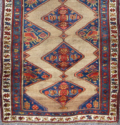 Colorful Long Antique Persian Serab Runner with Camel, Blue, Red and Brown The navy blue and camel field in this piece is decorated with multicolored strap work, lattice work and stylized Boteh and floral elements. Beautifully drawn ivory and bl... - Keivan Woven Arts20940 - 1438Rug