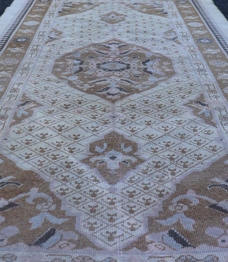 Antique Persian Serab Small Rug in Brown, Tan and Neutrals. Antique Persian Serab, Rug/21010. This beautiful Serab rug from the early 20th century rests on a cream background, which surrounds the medallion of alternating cream, pink, and brown ... - Keivan Woven Arts21010 - 189Rug