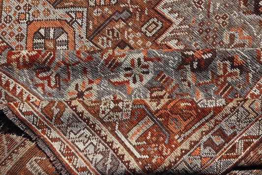 Measures: 6'10 x 9'0 
 
 Geometric Persian Shiraz Rug with Tri-Medallion Design in Shades Orange and Blue. Keivan Woven Arts / rug EMB-22132-15042, country of origin / type: Iran / Shiraz, circa 1910.
 
 
 
 This Persian Shiraz rug (circa early 20th ce...