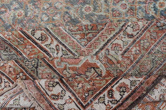Antique Persian Distressed Sultanabad with All-Over Sub-Geometric Herati Design
 
 
 
  This impressive antique distressed Persian Sultanabad rug features a superb all-over Herati and sub-geometric design throughout the entirety of the piece. The entir...