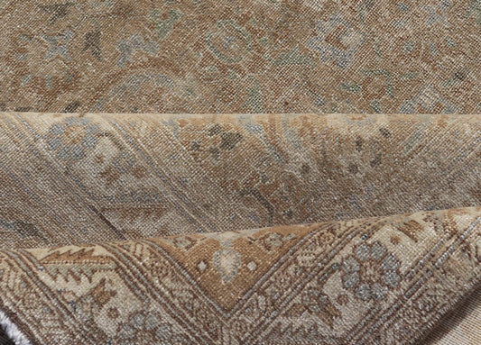 Measures: 8'0 x 10'9 
 
 Antique Persian Tabriz Rug in Wool with All-Over Floral Design in Earth Colors. Keivan Woven Arts / rug EMB-22210-15060, country of origin / type: Iran / Tabriz, circa 1920s.
 
 
 
 This Tabriz rug features a relatively intrica...
