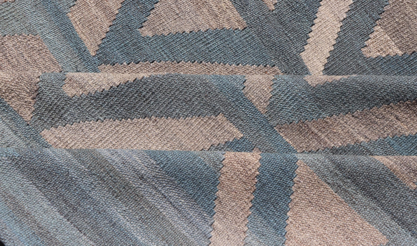 Modern Hand-Knotted Rug in Wool with Geometric Diamond Pattern in Blue and Brown
 
 
 
 This modern design kilim is hand-woven in Afghanistan. The rug features a modern geometric diamond design, replete with various motifs in multicolor, making this ru...