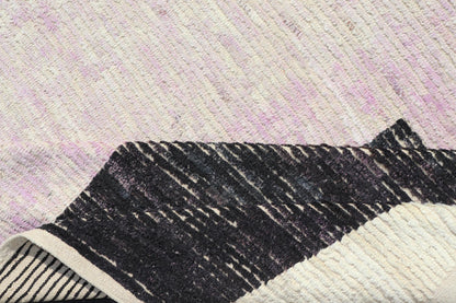 Modern Hand-Knotted Rug in Wool with Sub-Geometric Abstract Design in Multicolor
 
 
 
 This modern casual tribal rug has been hand-knotted in wool. The rug features a modern sub-geometric abstract design, rendered in multicolor, making this rug a supe...