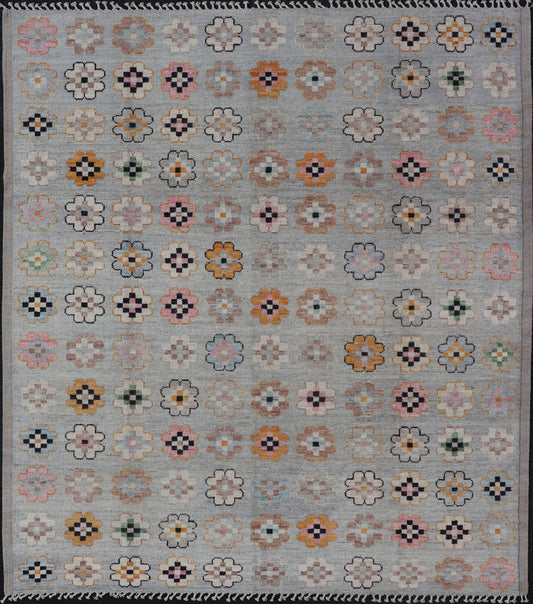 Modern Hand-Knotted Rug in Wool with Modern All-Over Flower Design On A Light Gray Field. Keivan Woven Arts; rug AWR-4995, country of origin / type: Afghanistan / Modern Casual, circa Early-21th Century.
 
 
 
 Measures: 9'9 x 11'6
 
 
 
 This modern c...