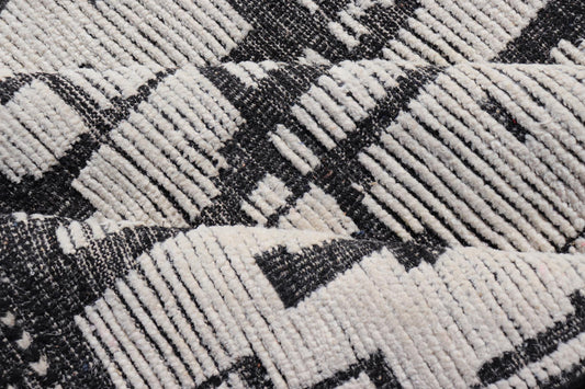 Large Moroccan Contemporary Abstract Rug in White and Black With All-Over Design by Keivan Woven Arts. Keivan Woven Arts; rug MSE-12898 Country of Origin: Afghanistan Type: Modern Casual Design: Abstract, Geometric, Contemporary. 
 
 Measures: 9'10 x 1...