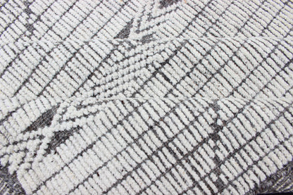 Modern Geometric Gray and Charcoal Indian Hand-Knotted Wool Rug 
 
 
 
 
 
 Measures 8'3 x 10'0 
 
 
 
 Country of Origin: India; Type: Modern, Modern Casual; Design: Geometric, Abstract, Tribal; Keivan Woven Arts: rug IN-ILM-1466-CO-0063; Modern Geome...