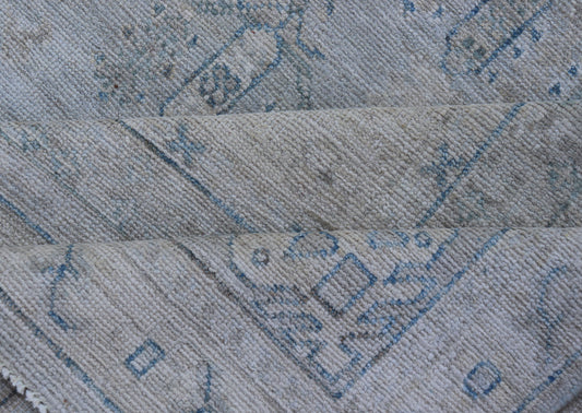 Measures: 8'10 x 11'8 
 
 Modern Designed Rug With A Light Blue Background and Tribal Medallion Motifs. Keivan Woven Arts; rug AWR-12323 Country of Origin: Afghanistan Type: Oushak Design: Floral, Medallion Abstract-Tribal 
 
 
 
 This Oushak presents ...