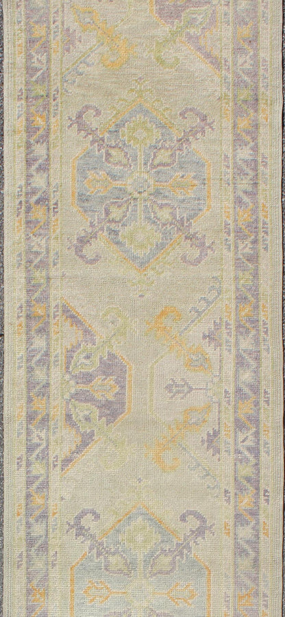 Turkish Oushak Runner with a Tribal Design in Purple, Blue and L.Green Colors kwarugs
 
 
 
 Turkish Oushak runner with purple, blue and L.Green colors and all-over Tribal design, rug en-165660, country of origin / type: Turkey / Oushak
 
 
 
 This tra...