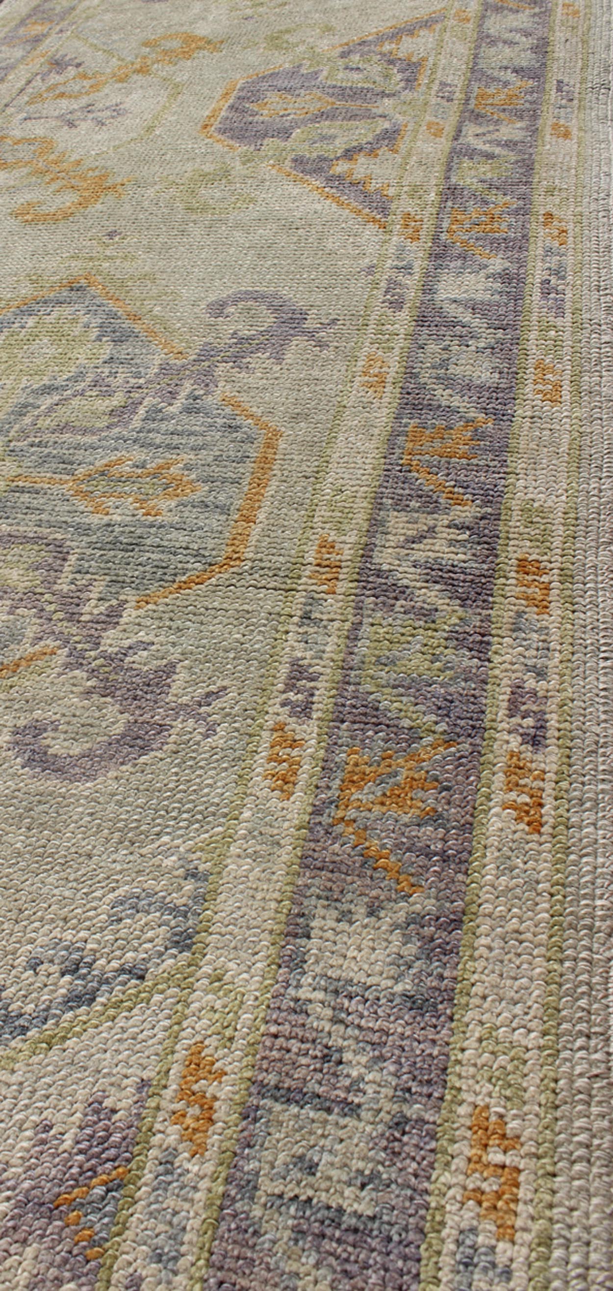 Turkish Oushak Runner with a Tribal Design in Purple, Blue and L.Green Colors kwarugs
 
 
 
 Turkish Oushak runner with purple, blue and L.Green colors and all-over Tribal design, rug en-165660, country of origin / type: Turkey / Oushak
 
 
 
 This tra...