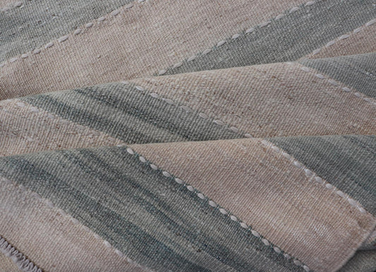 Vintage Turkish Kilim Runner with Horizontal Stripes of Light Green 
 
 
 
  Measures: 2'7 x 12'2 
 
 
 
 This vintage Turkish Kilim runner features light, faded colors in a simple striped pattern. Each of the charcoal and salmon panels are divided by ...
