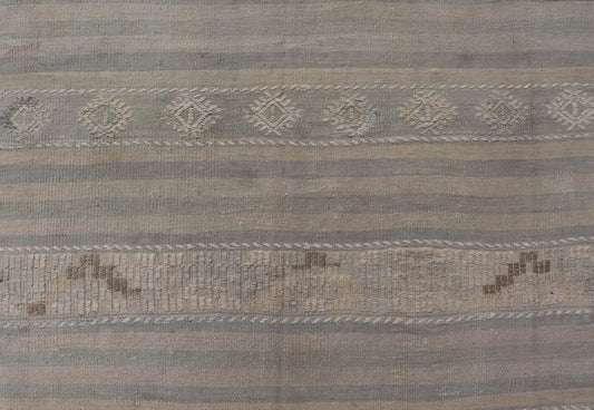 Measures: 6'6 x 10'0 
 
 Turkish Flat-Weave in Tan, Taupe, and Gray-Blue with Stripes and Embroideries. Keivan Woven Arts / Rug EN-15176, country of origin / type: Turkey / Kilim, circa 1950.
 
 
 
 This vintage Turkish Kilim rug features a contemporar...